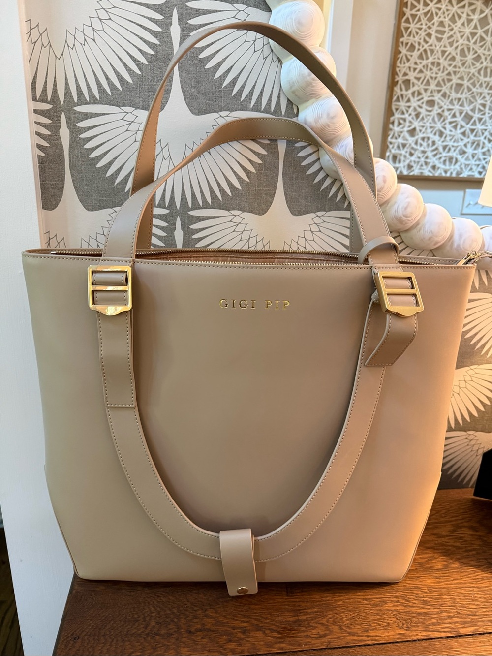 Beige Taupe Tote with Gold Hardware and hat carrying strap